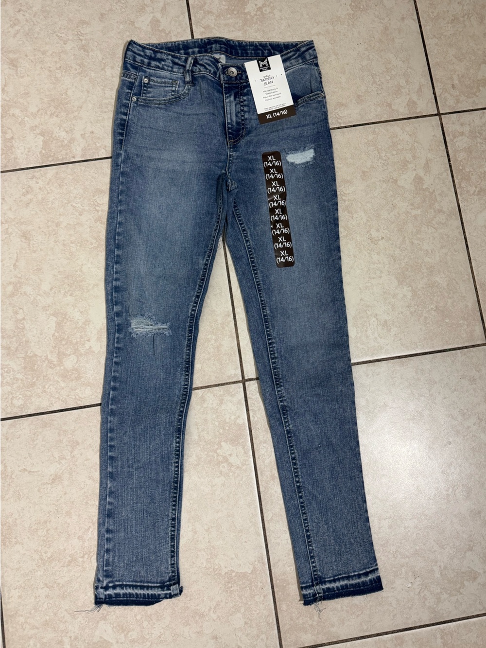 Women’s Distressed Blue Skinny Jeans